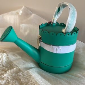 Kate Spade leather spring forward watering can NWT.